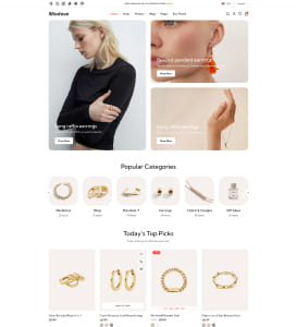 Elegant jewelry collection featuring rings, bracelets, and earrings in gold and silver tones.