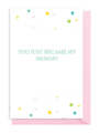A baby book cover titled 'You Just Became My Mommy' with colorful dots and pink spine.
