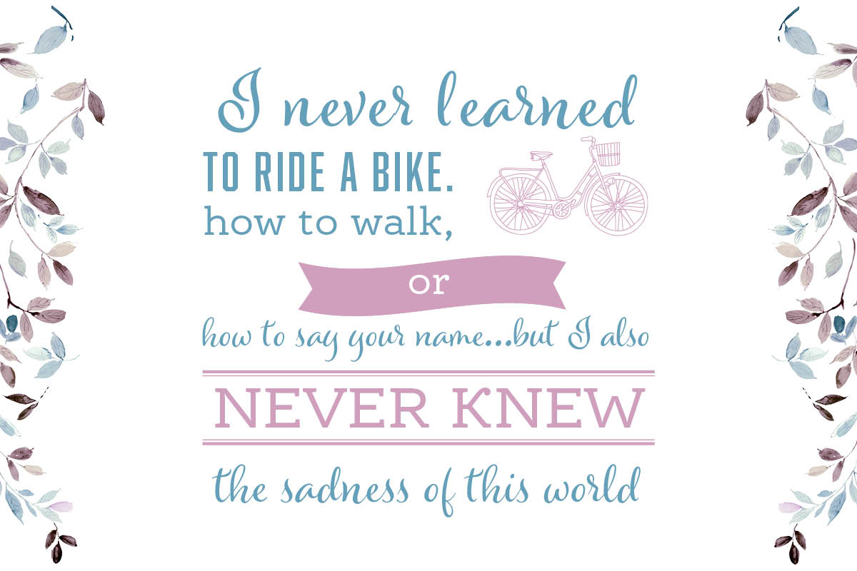 Decorative quote with bicycle and floral borders