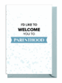 Greeting card welcoming someone to parenthood with a soft blue design.